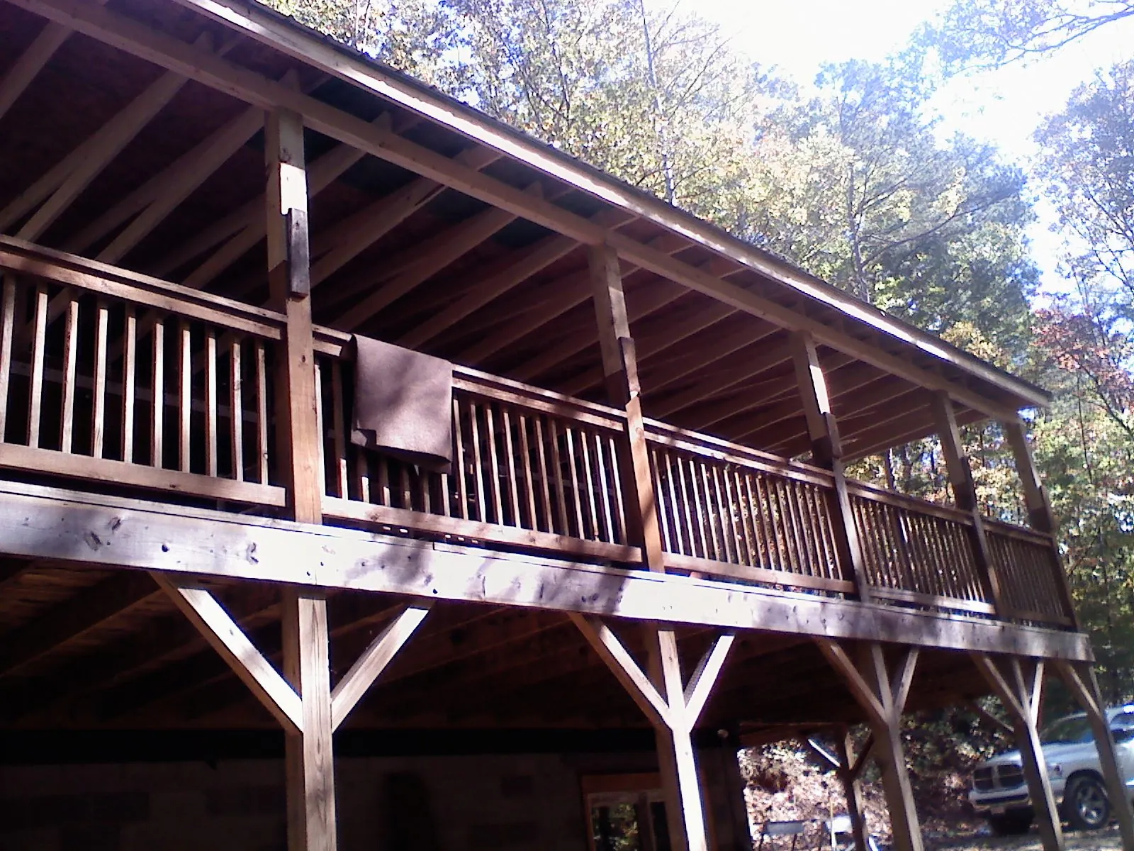 Timber framing under a new elevated porch and deck — Roof Leak Repair in Glasford by Roofing Brothers